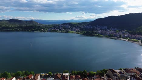 Aerial-Kastoria-Greece,-Lake-Orestiada-region-of-Macedonia-city-buildings-orange-roof