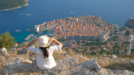 Woman-tourist-looking-at-City-of-Dubrovnik-Croatia