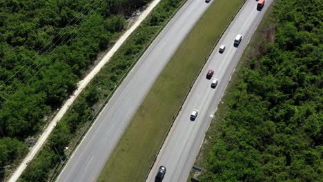 Aerial-view-on-crossroad-with-cars-and-traffic-lights.-Punta-Cana,-Bavaro,-Dominican-Republic