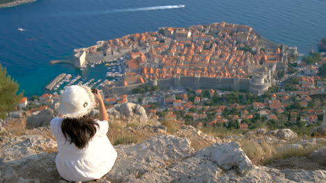 Woman-tourist-looking-at-City-of-Dubrovnik-Croatia