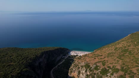 Remote-Beach-of-Gjipe-on-the-Albanian-Ionian-Coast-with-White-Sand-Washed-by-Blue-Seawater