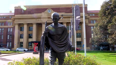 Mahatma-Gandhi-Statue-outside-the-Railway-Station-in-Wellington,-New-Zealand-Aotearoa-gifted-by-the-people-of-India