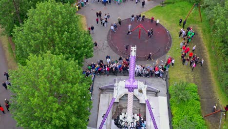 Aerial-of-adventure-rides-at-an-amusement-park-in-urban-residential-neighborhood