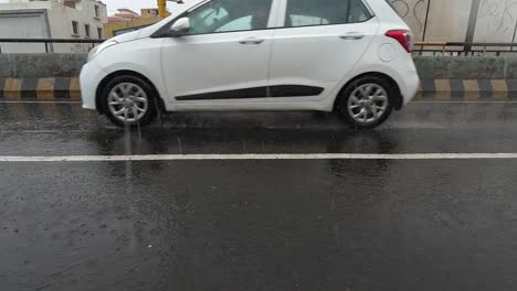 Vehicular-traffic-is-visible-on-the-bridge-in-the-ongoing-rain