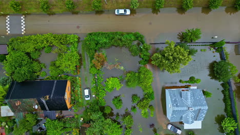 Aerial-top-down-submerged-properties-in-Jelgava,-Latvia,-flooded-town-Europe