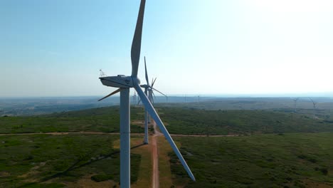 Aerial-establishing-shot-of-a-EDF-Energy-windfarm-in-the-French-countryside