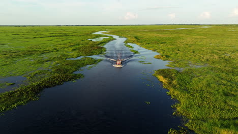 People-On-Boat-Ride-Through-Venezuelan-Llanos-In-Los-Llanos,-Venezuela