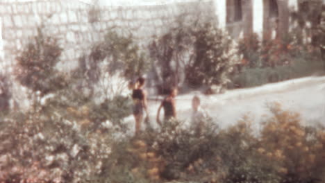 People-Relaxing-and-Strolling-Through-Historic-Streets-of-Korcula-Island-1960s