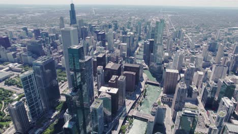 Aerial-Chicago-downtown-skyline-building-and-drone-view-along-skyscrapers-at-sunny-day-circle-shot