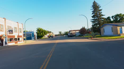 Car-Mounted-Golden-Hour-Drive-Down-Main-Street-Wawanesa-Manitoba