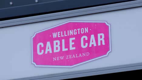 Close-up-of-Welllington-Cable-Car-New-Zealand-sign-at-popular-tourism-attraction-in-capital-city-of-NZ-Aotearoa