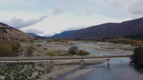 Aerial-drone-shot-of-a-bridge-crossing-the-Wairau-river-in-New-Zealand-South-Island