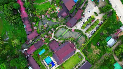 Aerial-View-Of-Above-Manuel-Resort-And-Garden-Descending-Drone-Shot-Time-Lapse