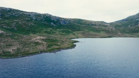 A-Picturesque-View-of-the-Serene-Waters-of-Pålvatnet-Lake-in-Åfjord,-Trøndelag-County,-Norway---Drone-Flying-Forward