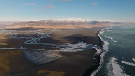 Glacier-and-volcano-Eyjafjallajökull-in-Iceland,-aerial-panorama-view-with-coast