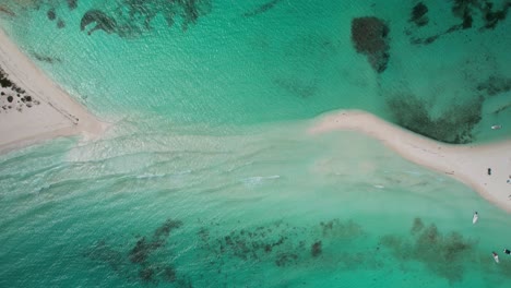 Turquoise-waters-and-white-sandy-isthmus-at-cayo-de-agua,-los-roques,-aerial-view