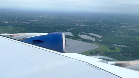 Passengers-Window-View-Of-A-Commericial-Aeroplane-During-Landing-In-London,-England