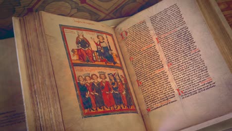 Exquisite-medieval-Bible-manuscript-showcased-in-Hohenzollern-Castle,-Germany,-capturing-the-essence-of-historical-preservation