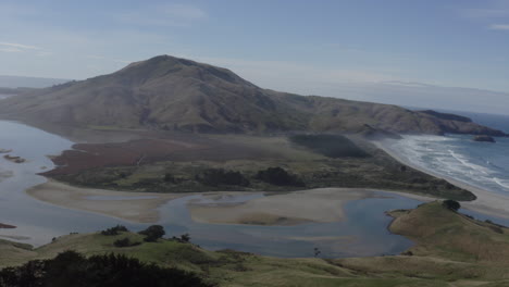 Aerial-drone-shot-of-Hoopers-Inlet-near-Dunedin,-South-Island-New-Zealand