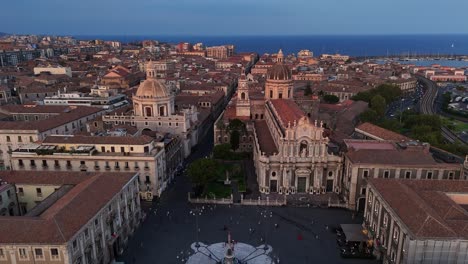 Cathedral-Square-in-Catania-at-sunset-with-views-of-historical-architecture-and-the-sea