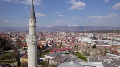 Flying-close-past-a-minaret-of-a-mosque-in-Skopje-city-in-Macedonia