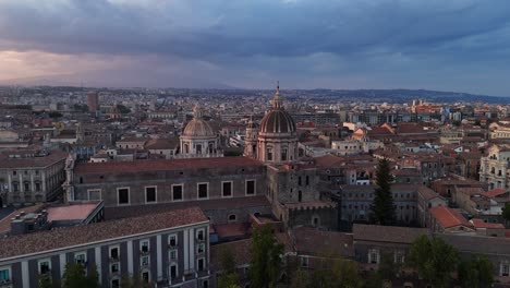 Scenic-aerial-view-of-Rome-at-sunset-with-historic-buildings-and-dramatic-sky