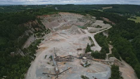 Smooth-approaching-aerial-movement-towards-an-ordinary-industrial-quarry-in-France