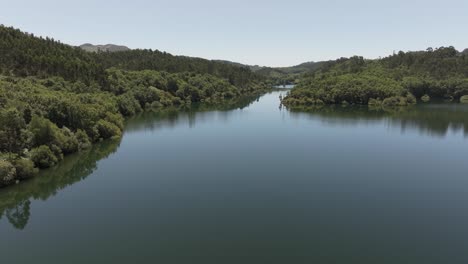 Still-Lake-Waters-With-Forest-Trees-Reflection-In-Pontevedra,-Galicia,-Spain