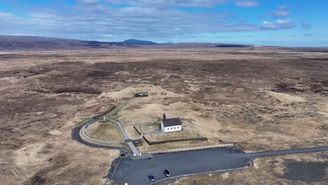 Serene-graveyard-and-church-on-a-hill-with-panoramic-views-of-the-ocean-and-surrounding-landscape