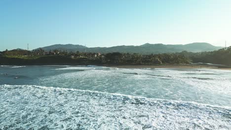 Balian-Beach,-where-the-ocean-whispers-secrets-to-the-seashore,-aerial