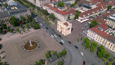 Potsdam-city-center-with-historical-buildings,-showing-brandenburger-gate,-street-and-luisenplatz-square-on-a-sunny-summer-day