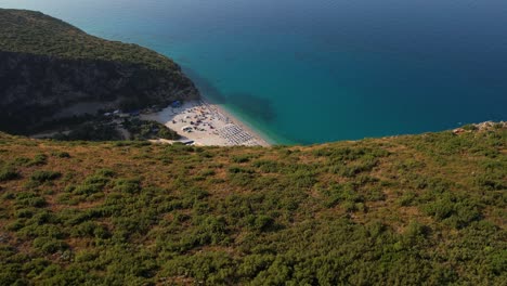 Hidden-Beach-Behind-Rocky-Hills-of-the-Ionian-Coast-with-White-Sand-Washed-by-Blue-Sea-in-Gjipe,-Albania