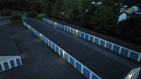 Storage-facility-with-blue-garage-doors-in-a-suburban-area