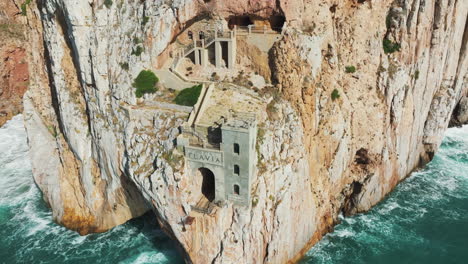 Aerial-Panorama-of-Porto-Flavia:-Sardinia’s-Historic-Mining-Port-on-a-Spring-Day