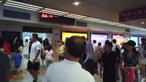 Xian,-China---July-2019-:-People-in-the-underground-passage-to-the-tube-station