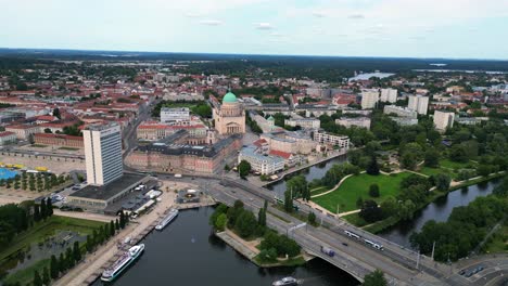 Potsdam-city-center-with-red-roofs-and-river-Havel-surrounding-it-on-a-sunny-and-cloudy-day