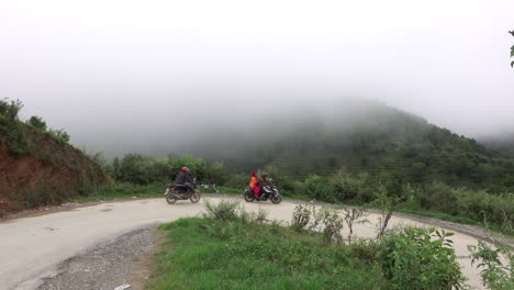 Kathmandu,-Nepal---September-27,-2019:-Traffic-and-vehicles-on-a-dangerous,-muddy-mountain-road-in-the-foothills-of-Kathmandu,-Nepal-on-September-27,-2019