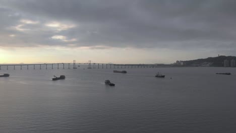 Aerial-shot-of-Macau-bay-with-scattered-boats-during-sunrise