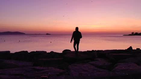 AERIAL:-Man-walking-in-Sunset-in-istanbul