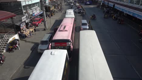 Stabilized-cinematic-shot-from-a-bridge-of-vehicle-traffic