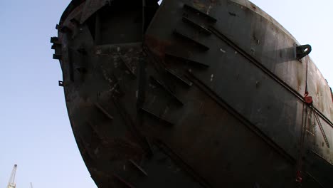 Ship-bow-being-transported-within-a-ship-repair-and-dry-dock-facility