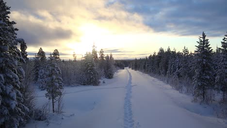 Timelapse-shot-of-moving-clouds-over-winter-landscape-in-northern-Sweden