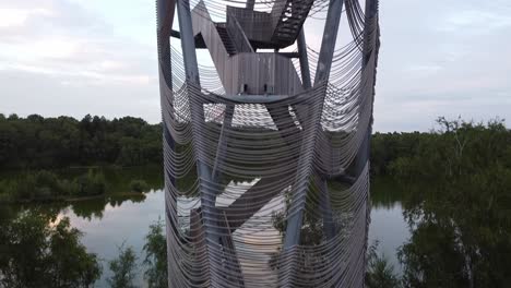 Moving-upwards-aerial-of-the-sahara-tower-in-Lommel,-Belgium