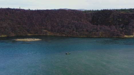 Aerial-drone-footage-of-anglers-fly-fishing-from-a-boat-on-the-Naknek-River-in-Bristol-Bay-Alaska