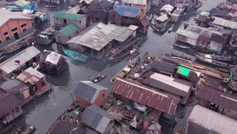 Makoko-Community,-Lagos,-Nigeria---30-June-2024:-Drone-view-of-Makoko-community-across-the-3rd-Mainland-Bridge