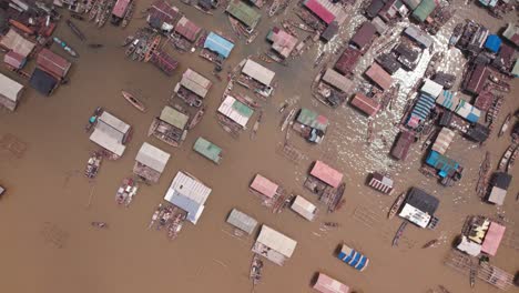 Makoko-Community,-Lagos,-Nigeria---30-June-2024:-Drone-view-of-Makoko-community-across-the-3rd-Mainland-Bridge