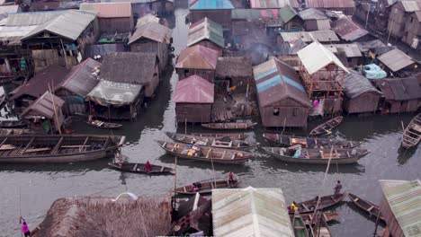 Makoko-Community,-Lagos,-Nigeria---30-June-2024:-Drone-view-of-Makoko-community-across-the-3rd-Mainland-Bridge