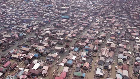 Makoko-Community,-Lagos,-Nigeria---30-June-2024:-Drone-view-of-Makoko-community-across-the-3rd-Mainland-Bridge