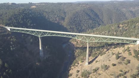 Slow-Zoom-out-view-of-Foresthill-Bridge-taken-from-a-drone