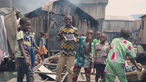 Makoko-Community,-Lagos,-Nigeria---30-June-2024:-Video-of-children-and-people-engaging-in-different-activities-in-Makoko-community-across-the-3rd-Mainland-Bridge